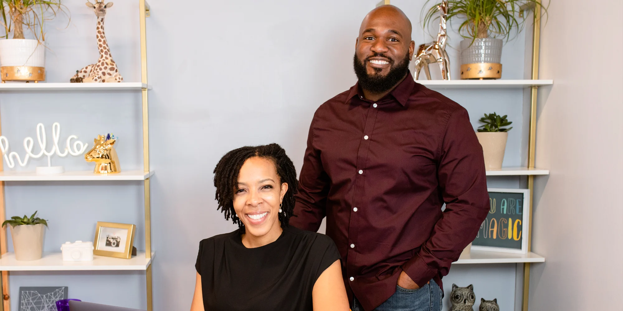 Chiropractor Warrensville Heights OH LaMar Hunter And Valerie Hunter At Desk